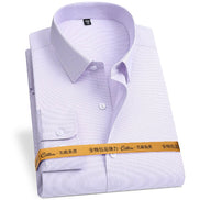 A folded long-sleeve dress shirt with a light lavender and white micro stripe pattern, featuring a collar and a gold paper band wrapped around the middle.