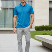 Blue polo shirt on a white background