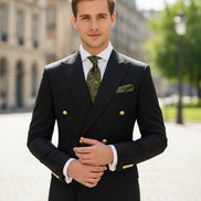 Brown suit jacket with gold buttons and matching pants on a white background