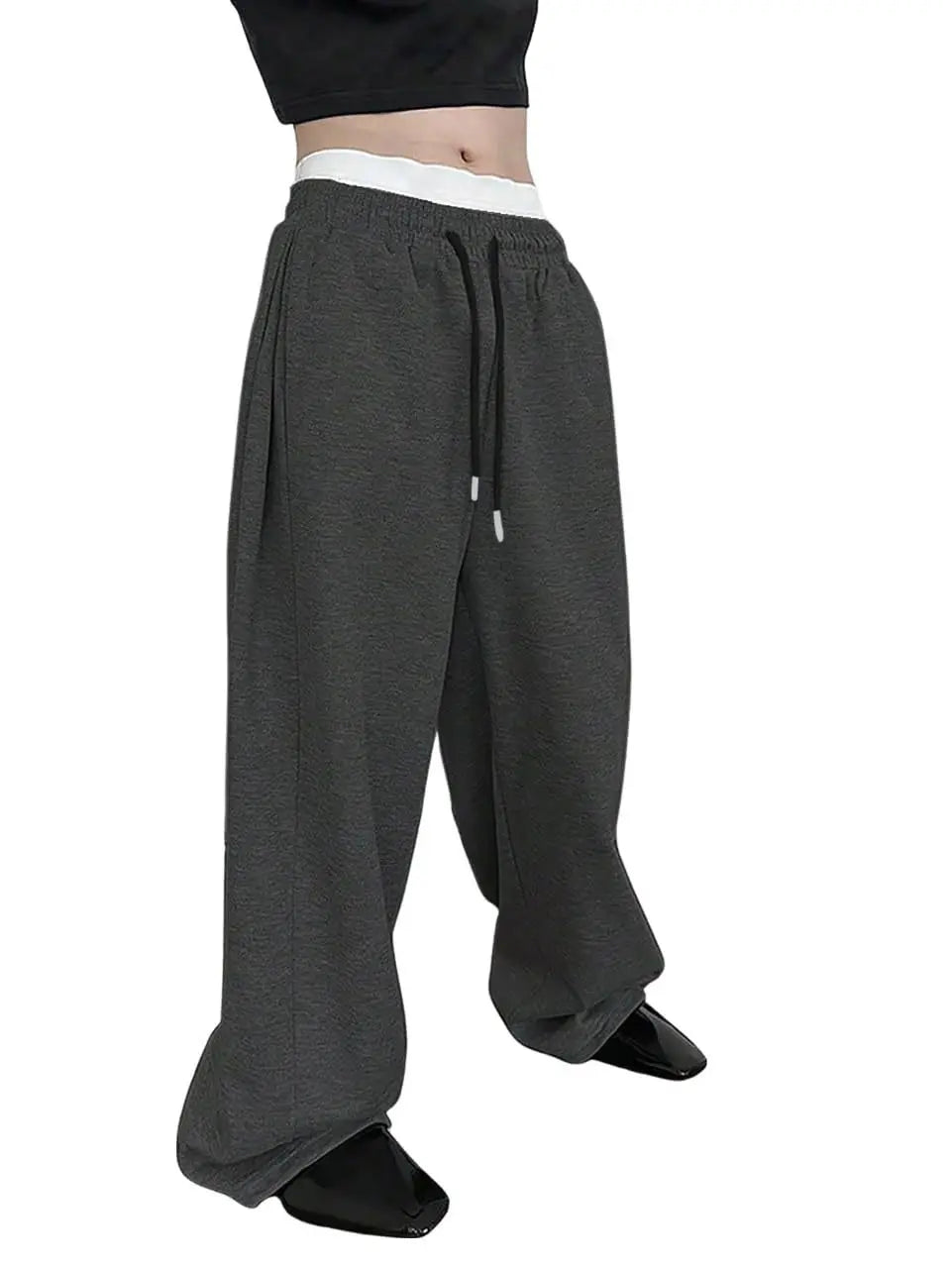 Gray wide-leg pants worn by a person on a white background