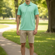 Green polo shirt on a white background
