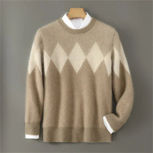 A beige and cream argyle knit sweater displayed on a wooden hanger against a solid gray background.