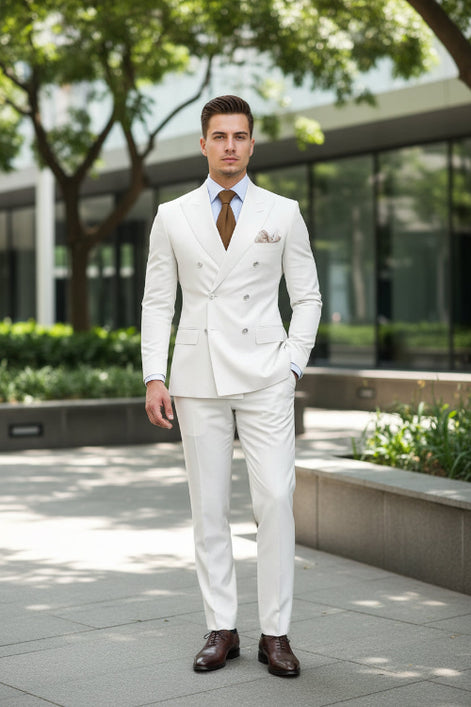 White suit jacket with a brown tie and pocket square on a dark background