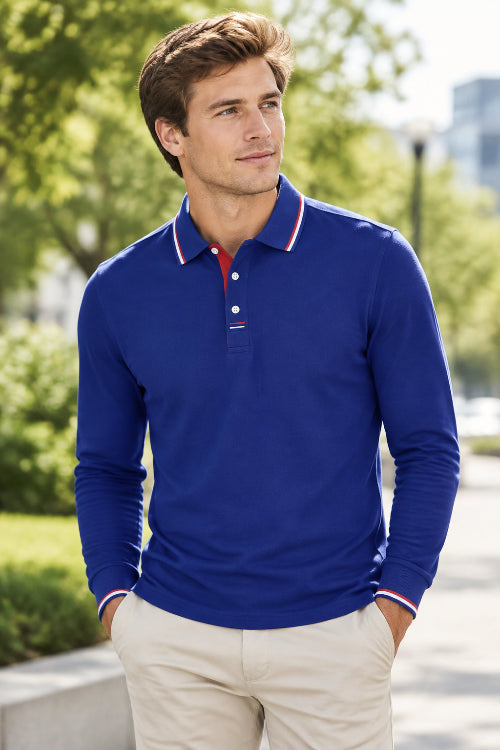 A royal blue long-sleeve polo shirt with a red and white striped collar and matching striped placket details, 