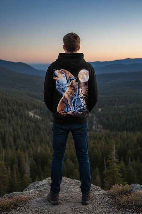 Hoodie with a design of wolves howling at the moon on a black background