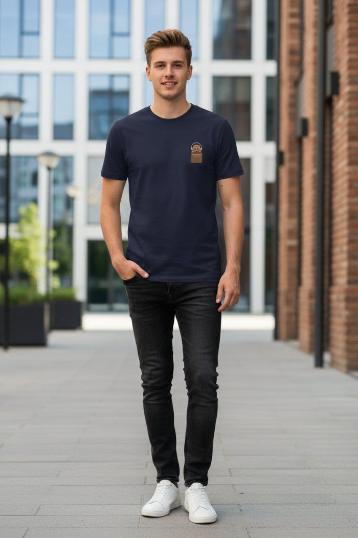 Navy blue t-shirt with a brown patch on a hanger against a white background