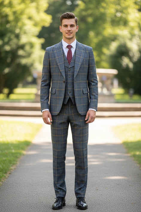 Blue checkered suit on a mannequin with a brown curtain background