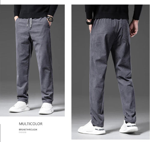 A split-view catalog image showing a man modeling gray drawstring sweatpants from the front and back, paired with a black top and white sneakers. 