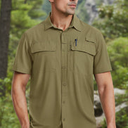Man wearing a green short-sleeve shirt with pockets on a white background