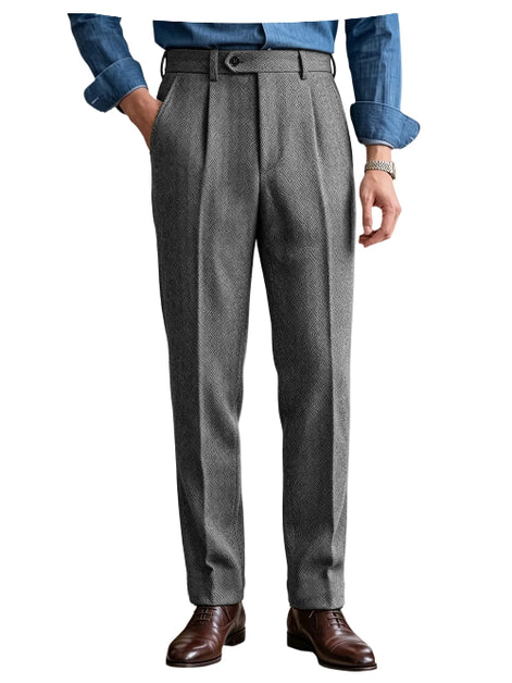 Gray herringbone pleated suit trousers shown on a white background