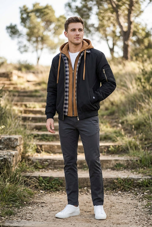 A men's black hooded jacket with tan fleece lining, a tan quilted interior, and a plaid patterned inner placket, shown on a white background.