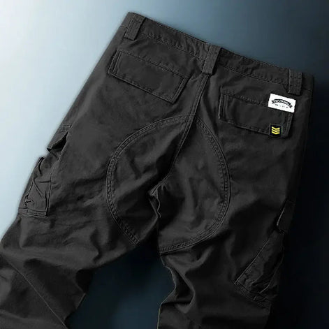 Black cargo pants shown flat from the back.