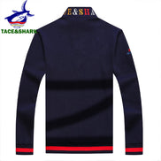 Navy blue long-sleeve shirt with red accents on a white background, featuring the Tace & Shark brand.