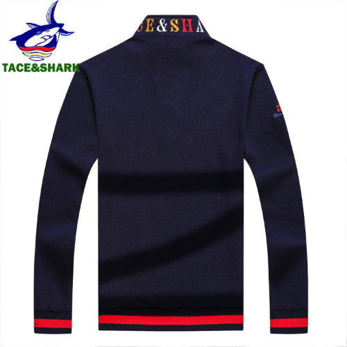 Navy blue long-sleeve shirt with red accents on a white background, featuring the Tace & Shark brand.