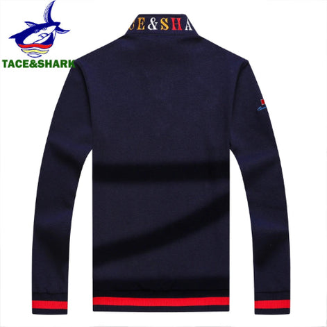 Navy blue long-sleeve shirt with red accents on a white background, featuring the Tace & Shark brand.