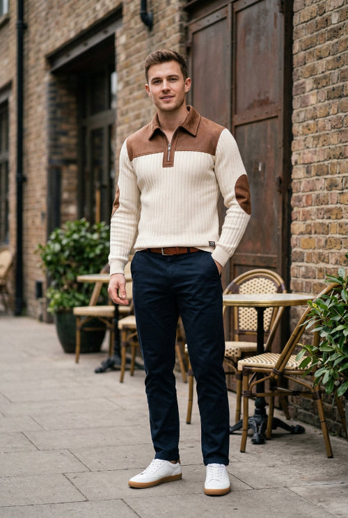 White sweater with brown accents on a white background