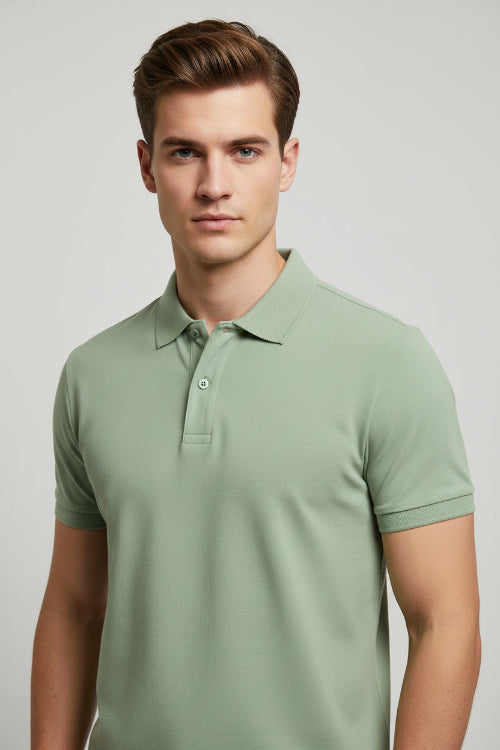 Light green polo shirt on a white background