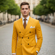 Yellow suit with a brown tie and white shirt on a white background