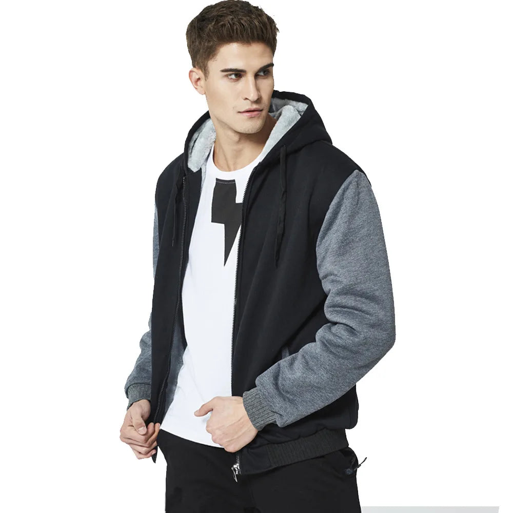 Man wearing a black and gray hoodie on a white background