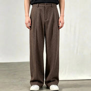 Brown herringbone wide-leg pants shown on a white background