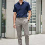 Brown pants with a belt on a white background