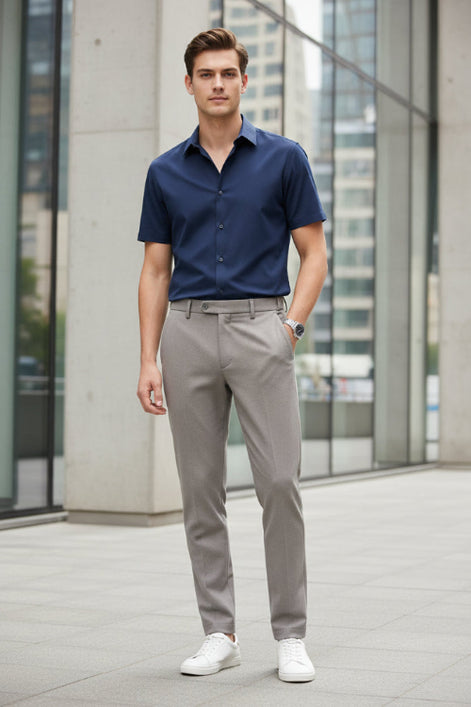 Brown pants with a belt on a white background