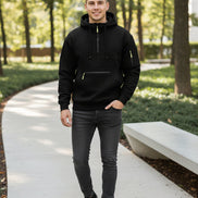 Black hoodie with yellow zippers on a white background