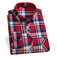 A folded long-sleeve plaid button-down shirt with a red, blue, white, and black tartan pattern, displayed on a clean white background.