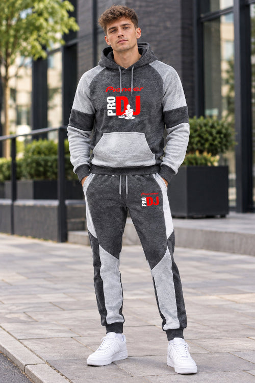 A two-piece athletic tracksuit set featuring a long-sleeve hoodie and matching jogger pants. 