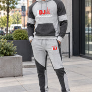 Gray and black hoodie and pants set with Motomorini logo on a white background