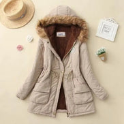 Beige winter coat with fur-lined hood on a beige background