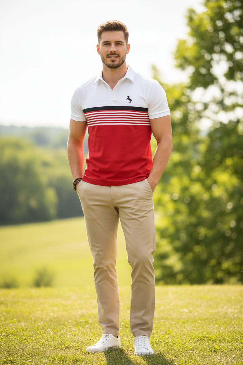 White polo shirt with red and black stripe design worn by a person, with a blurred background.