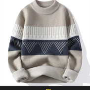 Beige and blue striped sweater on a white background
