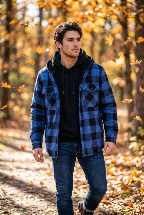 A blue and black plaid hooded jacket with a black fleece lining, shown on a white background with smaller color variants along the right side and a flame graphic with the word 'Warm' 