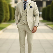 Beige suit with a tie and pocket square on a white background