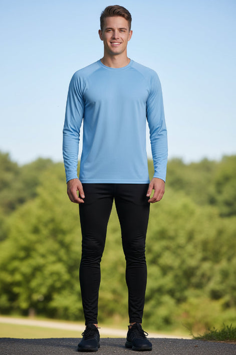 Man wearing a light blue long-sleeve shirt with TacVasen branding on a white background.