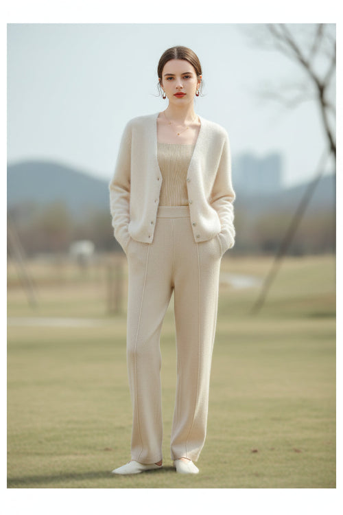 A woman wearing a fuzzy cream-colored cardigan sweater over a beige top, with a text overlay at the top reading 'COLOUR/米色'.