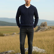 Blue textured sweater in a box with a watch on a gray surface, featuring the brand 'Lidou'.