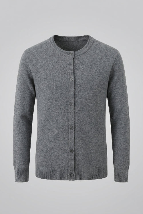 A gray knit cardigan sweater with a crew neck and button-front closure, hanging on a dark wooden hanger against a solid gray background.