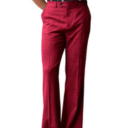 Red pants worn by a person on a white background