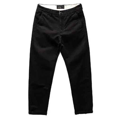 Black slim-fit chino pants shown flat against a solid white background.