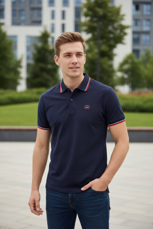 A navy blue short-sleeve polo shirt with red and white striped trim on the collar and sleeve cuffs, featuring a small embroidered shark logo 