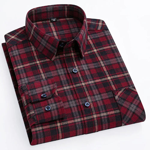 A folded long-sleeve plaid button-up shirt in red, black, and beige, shown on a clean white background.