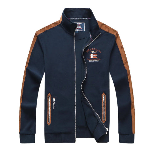 A navy blue zip-up jacket with brown shoulder panels and brown zipper pulls, featuring a high collar, white zipper lines, and a 'Socataj' embroidered patch on the left chest.