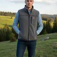 Gray vest with mesh panels on a white background