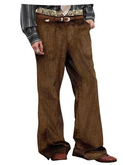A person wearing brown corduroy wide-leg pants with a brown belt, a patterned waistcoat, and brown shoes, shown from the waist down on a white background.