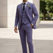 Purple suit with a tie and boutonniere on a white background