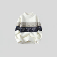 White sweater with black and gray pattern on a white background