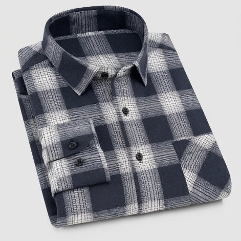 Folded black and gray plaid shirt on a white background with 'XDM21' label.