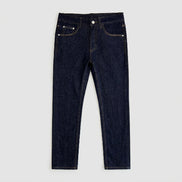 Dark indigo blue denim jeans laid flat on a white background, showing the front waistband, belt loops, button, pockets, and contrast stitching.